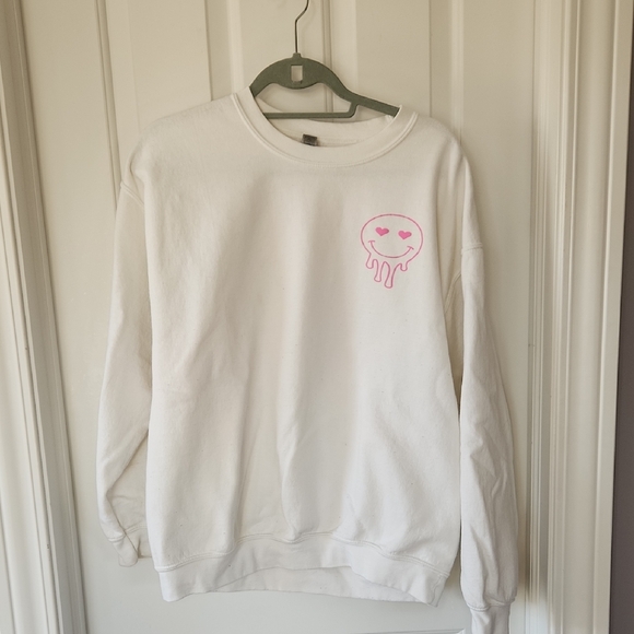 Gildan Sweaters - Gildan White Sweatshirt with Pink Smiley Graphic